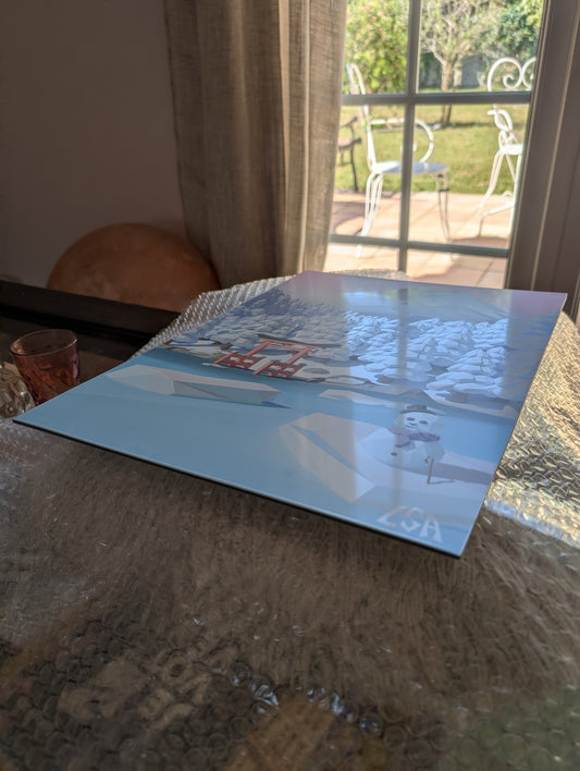 light reflecting on aluminium print to show the glossy finish