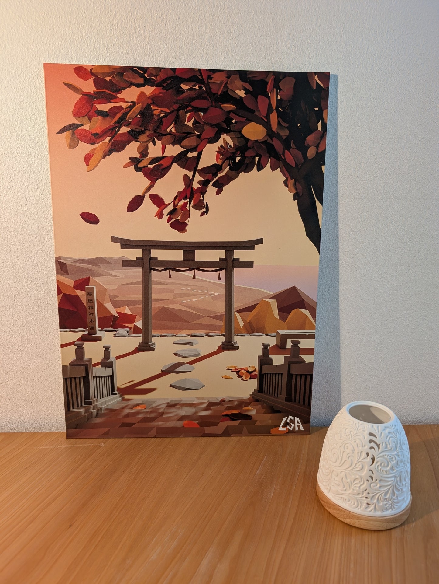 Aluminium print depicting a canal in tokyo lined with blooming pink cherry blossom trees, with a small bridge and buildings in the background in low-poly stye